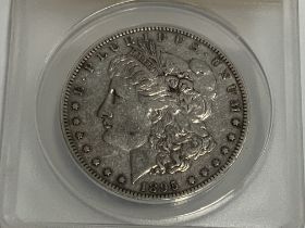 1895 graded United States Morgan Silver Dollar, Ne