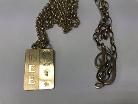 Two 9 ct gold chains with attached pendants 15.4 grams