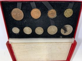 A 1950 speck in coin set with the original present