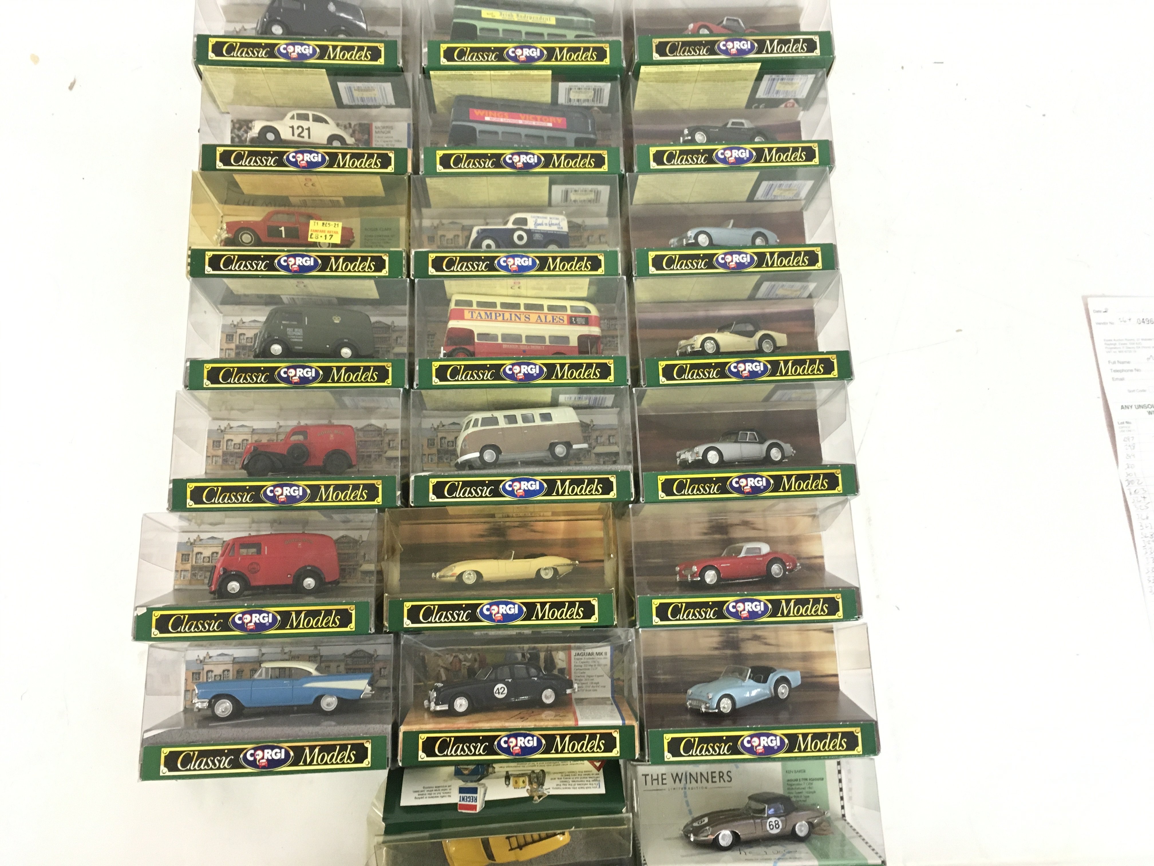 A collection of 23 boxed model cars by Corgi in th