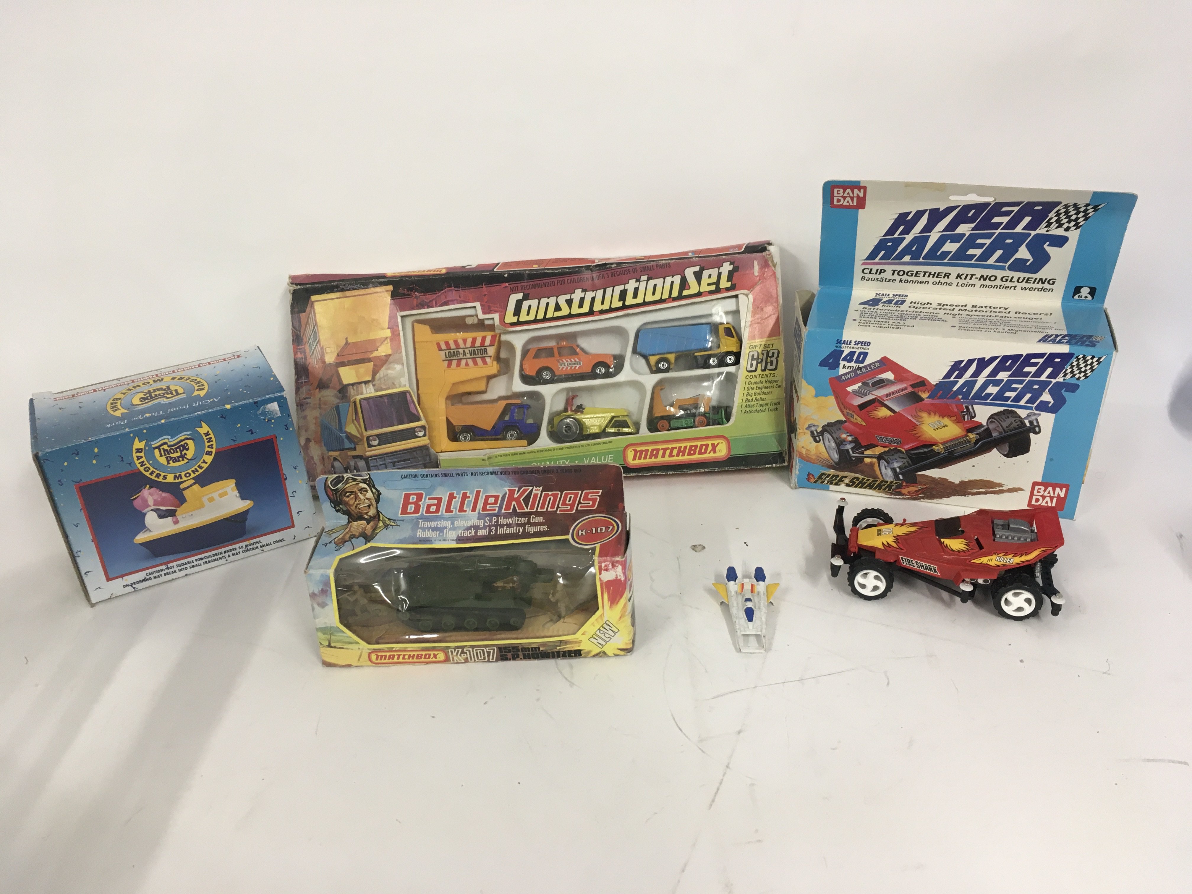 A collection of diecast cars and vehicles.
