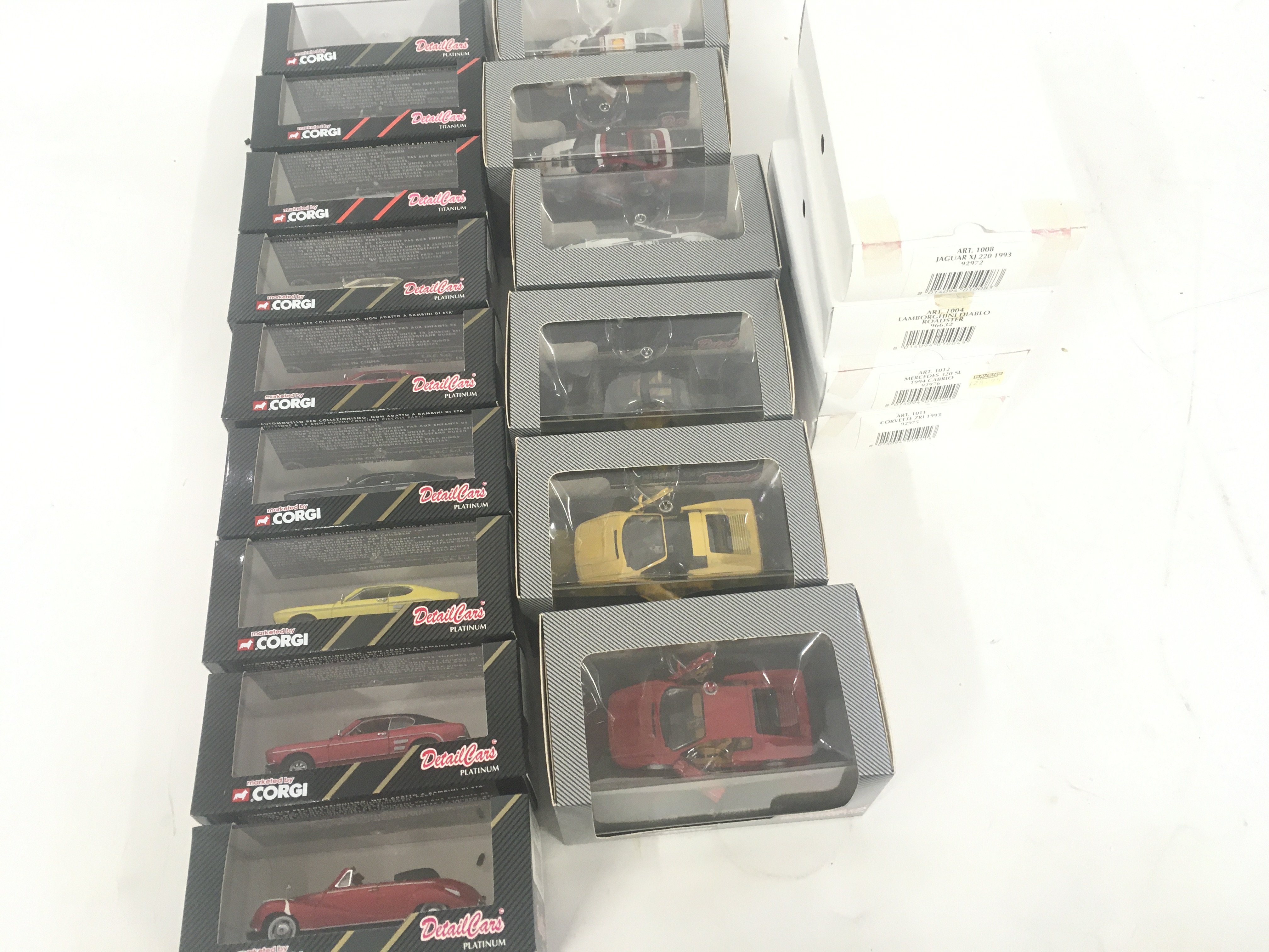 A collection of boxed model cars by Corgi in the D