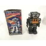 A boxed battery operated robot called ASTRONAUT it