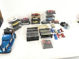 A collection of model cars by a variety of manufac