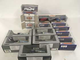 A collection of boxed model cars by Corgi and Dink
