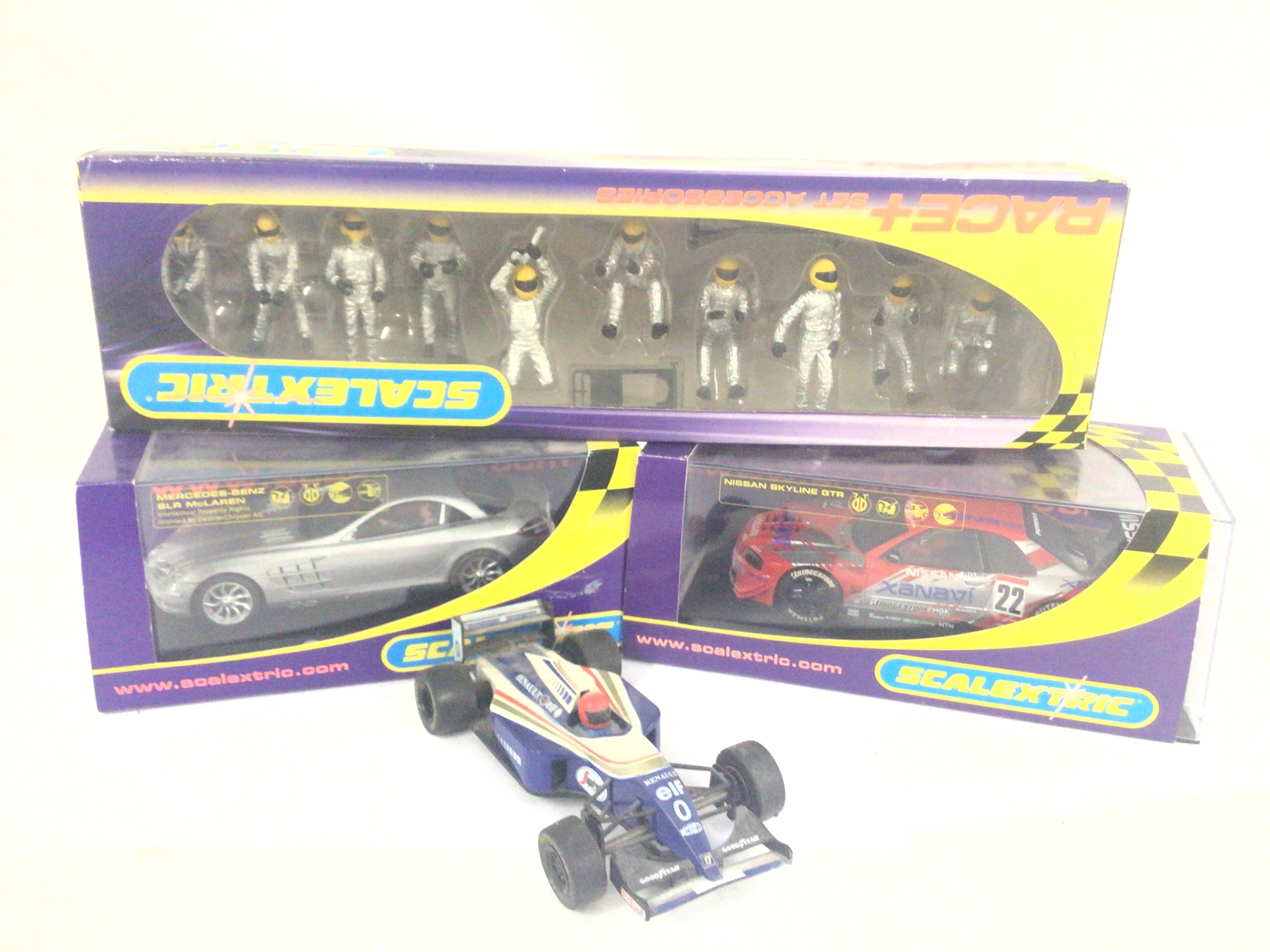 2 X Boxed Scalextric Cars. A Set Of Accessories an