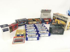 A collection of boxed model cars by various manufa