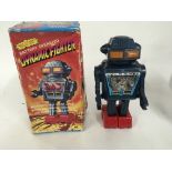 A boxed battery operated robot made in Japan by JU