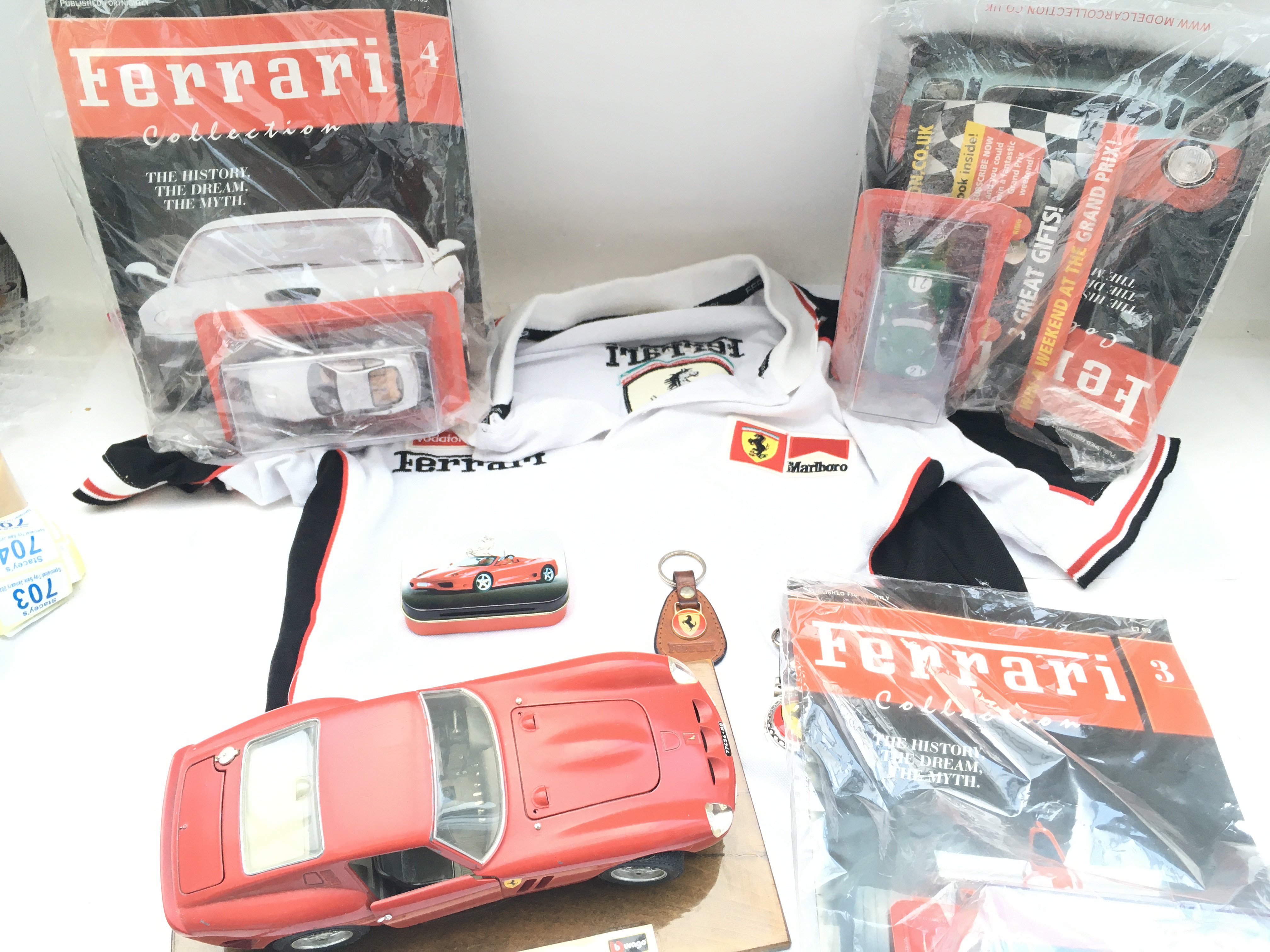 A Collection of Ferrari Merchandise. Including Magazines. Mugs.dvds. Key rings.caps. Glasses Etc. - Image 5 of 7