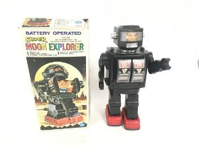 A boxed battery operated robot with several featur