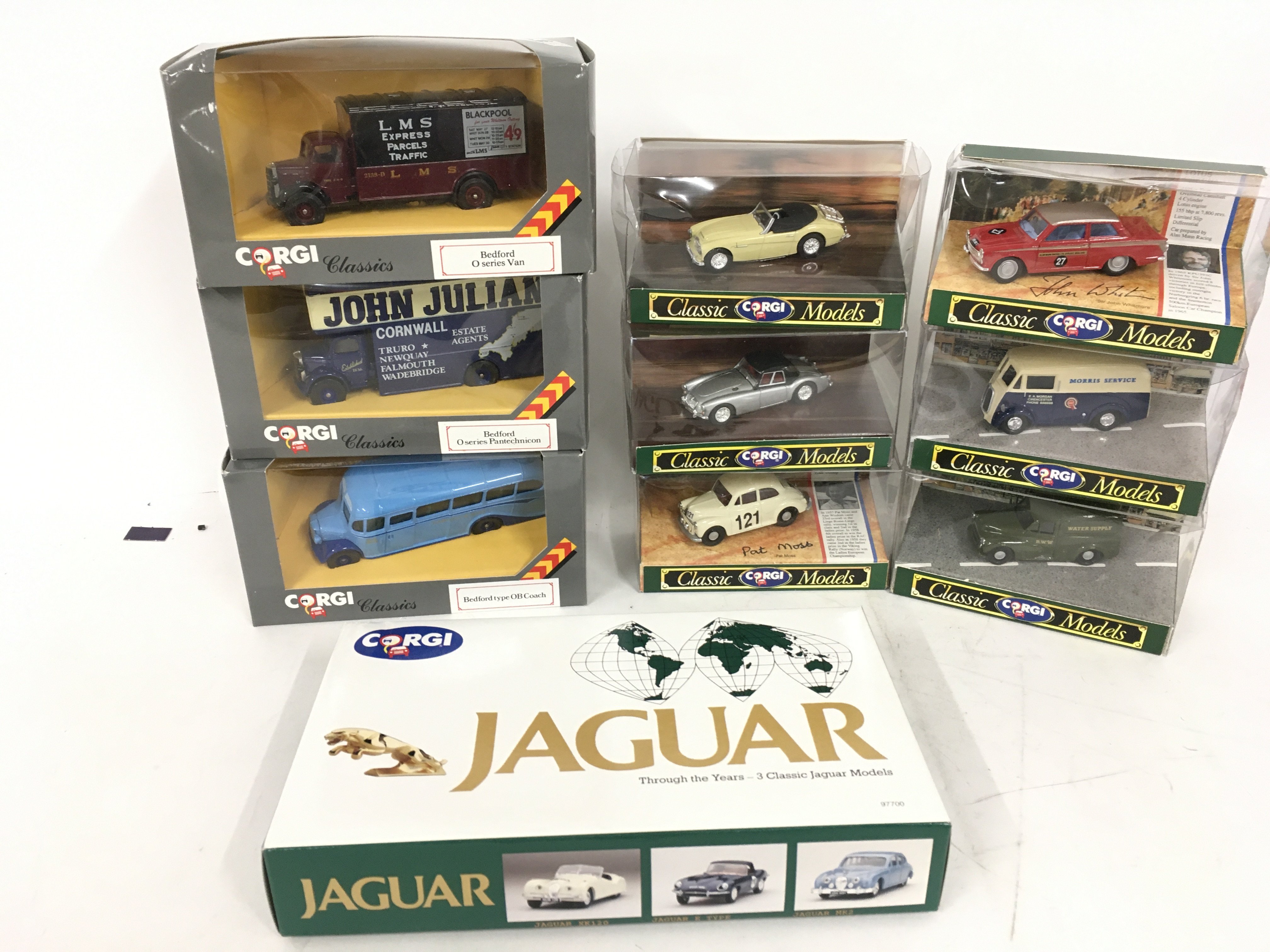A collection of 10 unopened boxed model vehicles b