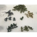 A collection in excess of 70 plastic soldiers from