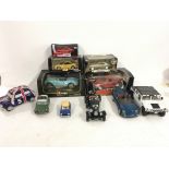 A collection of 11 model cars in varying scales 5