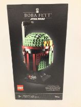 A Boxed and Sealed Lego Star Wars Boba Fett Helmet. #75277.