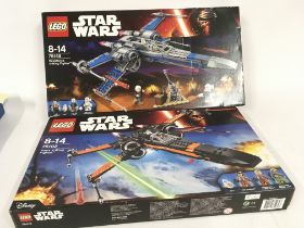 2 boxed Lego sets. Star Wars 75149 RESISTANCE X WING FIGHTER and 75102 POES X WING FIGHTER.