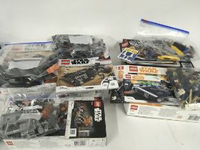 Collection of 4 boxed Lego sets. All Star Wars. 95284 KNIGHTS OF REN TRANSPORT SHIP. 75209 HANS SOLO