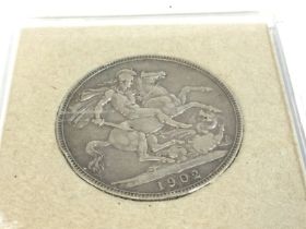 A 1902 silver crown. Postage A