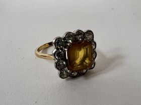 A 1940s 18ct yellow gold ring set with a central e