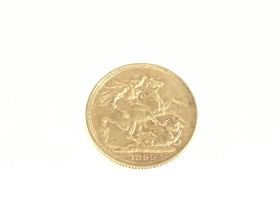 A 1899 full sovereign. Postage A