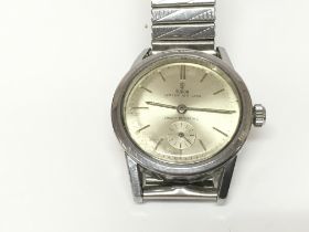 A vintage circa 1940s Tudor oyster air lion watch.