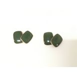 A pair of 9ct gold cufflinks set with green stone.
