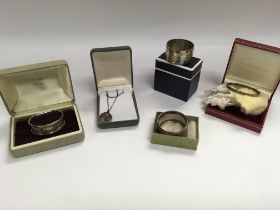 A mixed lot of silver items, including napkins rin