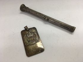 A silver ingot with a silver pencil, Approx weight