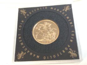 A 2015 full gold sovereign and a 1g Queen Elizabet