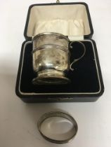 A silver christening mug Birmingham hallmarks and