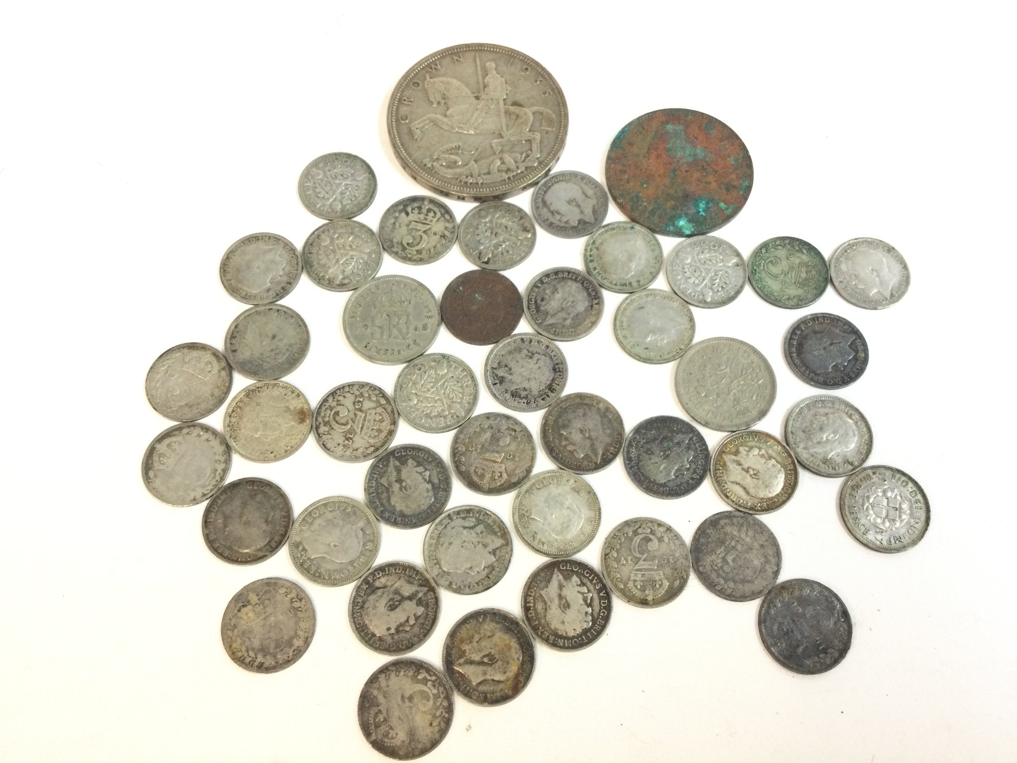 A 1935 crown and other coinage including multiple