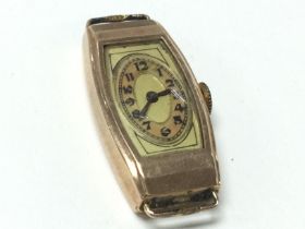 A 9ct gold ladies Art Deco watch, postage category