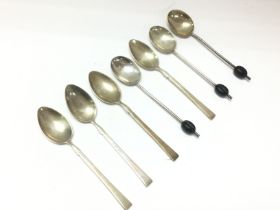 A collection of silver hallmarked coffee spoons. P