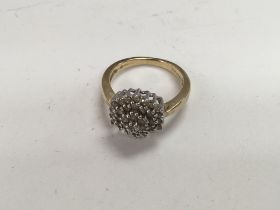 A 9ct gold diamond cluster ring, size R, weight 4.