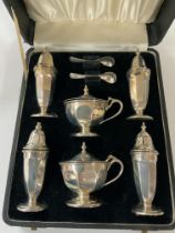 A cased hallmarked silver 6 piece cruet set, hallm