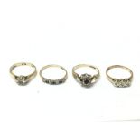 A collection of 9ct gold rings, one set with small