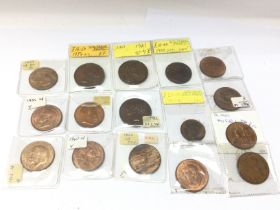 A collection of various pennies including a Victor