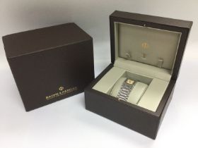A boxed Baume & Mercier watch. Shipping category B