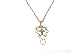 A 9ct gold chain and pendant set with pearls and p
