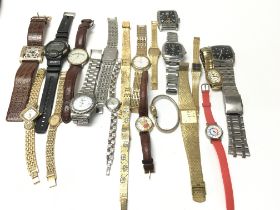 A large collection of assorted dress watches inclu