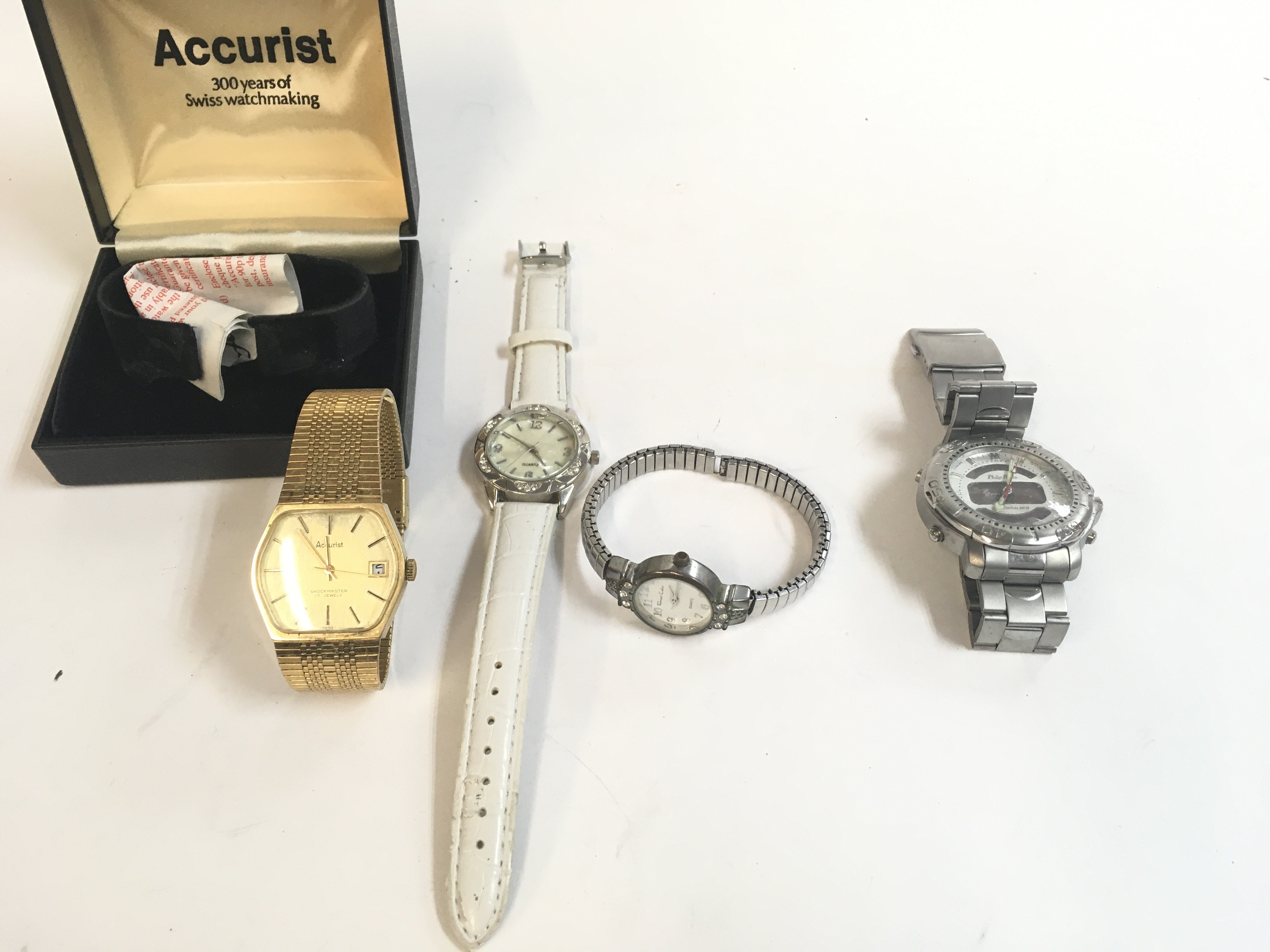 Four dress watches including a Accurist with box w