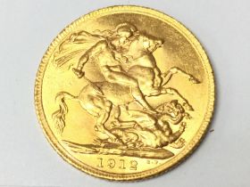 A 1912 Gold Sovereign, postage category A