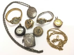 Lockets, gold case watches, silver vesta, etc. Pos