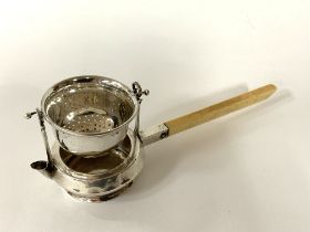 An unusual hallmarked silver tea strainer, marks f