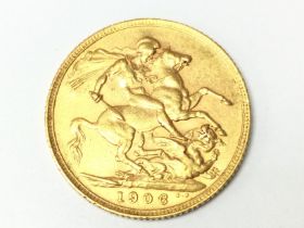 A gold 1906 sovereign, postage category A