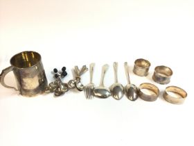 A collection of assorted silver items including a