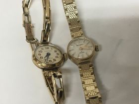 Two ladies watches with gold case and gold plated