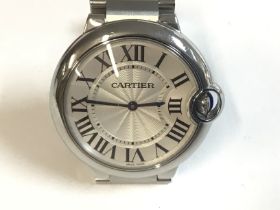 A Cartier balloon bleu 36mm silver dial 3005 wrist