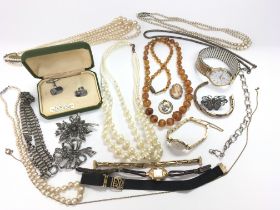 A mixed bag of costume jewellery. Postage category