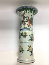 A famille verte vase decorated with figures in a g