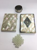 Two mother of pearl card cases, a jade item and a